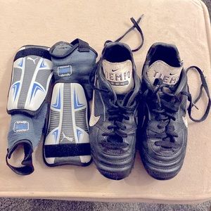 Kids soccer shoes and shin pads